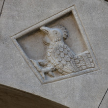 Fidenza, Duomo (Cattedrale di San Donnino), facciata, portale sinistro, protiro, serie di losanghe