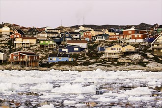 Village of Ilulissat as seen from the pack ice, Disko bay, Greenland