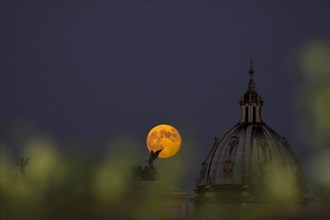 Moonrise seen  from a hotel, Rome, Italy