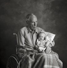 Elderly Man and Baby Portrait