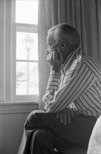 Elderly Man Seated in Window