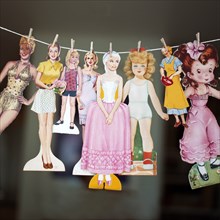 Female Paper Dolls on Clothesline