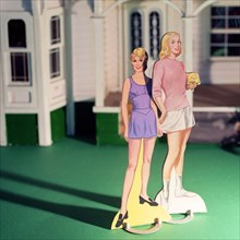 Two Sporting Female Paper Dolls