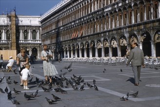 Women and Child Feeding Pigeons, Venice, Italy, 1956