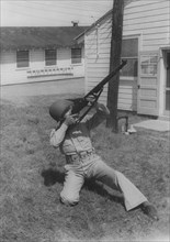 Soldier Displaying Proper Shooting Position During Training Session, WWII, 2nd Battalion, 389th Infantry, US Army Military Base Indiana, USA, 1942
