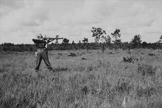 Soldier Displaying Proper Shooting Position in Field During Training Session, WWII, 2nd Battalion, 389th Infantry, US Army Military Base Indiana, USA, 1942