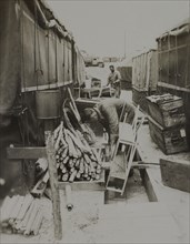 Soldiers in Storage Area Behind Tents, WWII, 325th Infantry, US Army Military Base, Camp Claiborne, Louisiana, USA, 1942