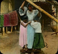 Helping Mamma Iron the Clothes, Philippines, Asia, Magic Lantern Slide, circa 1910