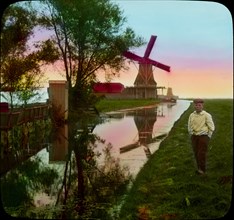 Portrait of Boy Near Canal and Windmill, "Holland as the World Knows Her", Magic Lantern Slide, circa 1910