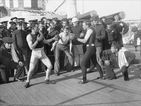 Two Naval Seamen Boxing on Anniversary of Battle of Santiago de Cuba, U.S.S. New York, USA, Detroit Publishing Company, 1899