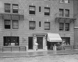 Woman Standing in front of Tenement Building, New York City, New York, USA, Detroit Publishing Company, 1905