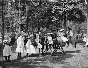 Children Sitting on See-Saw at Playground, Belle Isle Park, Detroit, Michigan, USA, Detroit Publishing Company, 1900