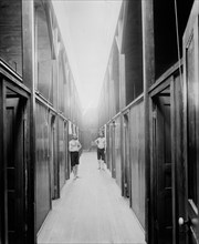 Two Men in Corridor of Mineral Bath House, Ypsilanti, Michigan, USA, Detroit Publishing Company, 1910