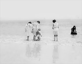 Three Young Girls with Child at Beach, Coney Island, New York, USA, Detroit Publishing Company, 1900