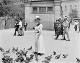 Woman Feeding Pigeons, Boston Common, Boston, Massachusetts, USA, Detroit Publishing Company, 1915