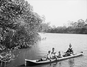Seminole Native American Family in Dugout Canoe, Miami, Florida, USA, Detroit Publishing Company, 1915