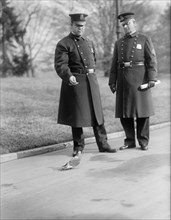 White House Police Officers Feeding Pigeon, Washington DC, USA, Harris & Ewing, 1915