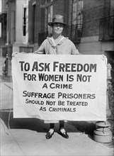 Suffragette Holding Protest Banner, USA, Harris & Ewing, 1917