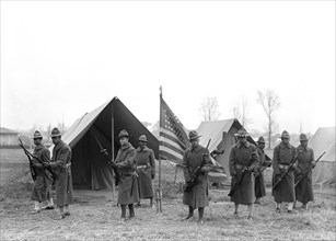 African-American Troops, Portrait Near Tents and American Flag, Harris & Ewing, 1917