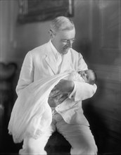 U.S. President Woodrow Wilson Holding Granddaughter, Ellen Wilson McAdoo, Portrait, Harris & Ewing, 1915