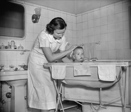 Woman Giving Baby a Bath, Harris & Ewing, 1937