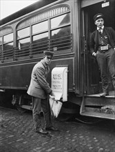 Mailman Collecting Mail from Mailbox on Train, USA, Harris & Ewing, 1921