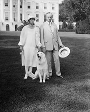 U.S. President Coolidge and Mrs. Coolidge with dog Outside White House, Washington DC, USA, Harris & Ewing, 1927