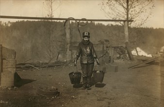 Young Boy Working as Greaser in Coal Mine, Bessie Mine, Alabama, USA, Lewis Hine, 1910
