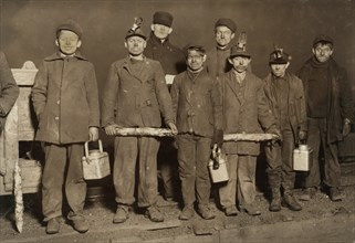 Portrait of a Group of Boys Just Up from the Coal Mine Shaft at the end of the Day, Pittston, Pennsylvania, USA, Lewis Hine, 1911
