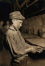 Young Boy Working at Lehr at Glassmaking Company, Works Nine Hours, Day Shift One Week, Night Shift Next Week, Grafton, West Virginia, USA, Lewis Hine, 1908