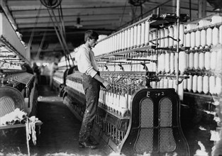 Man Working at Spinning Frame at Cotton Mill, Newton, North Carolina, USA, Lewis Hine, 1908