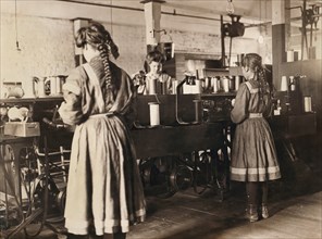 Three Girls Working in Spool Cotton Department, Bibb Manufacturing Company, Macon, Georgia, USA, Lewis Hine, 1909