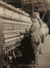 Two Young Boys Working as Doffers at Cotton Mill, North Pownal, Vermont, USA, Lewis Hine, 1910