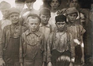 Portrait of a Group of Very Young Boys Working at Avondale Textile Mill, Birmingham, Alabama, USA, Lewis Hine, 1910