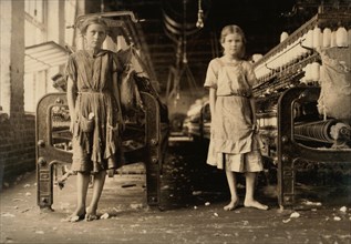 Portrait of Two Young Girls Working as Spinners at Cotton Mill, USA, Lewis Hine, 1911