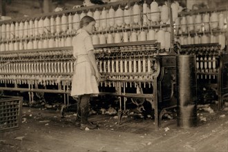 14-year-old Girl Working as Spinner at Cotton Mill, West, Texas, USA, Lewis Hine, 1913