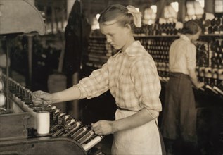 15-year -old Girl Working as Spooler Tender in Cotton Mill, Adams, Massachusetts, USA, Lewis Hine, 1916