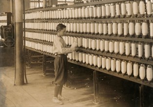 14-year-old Boy Working in Cotton Mill, Adams, Massachusetts, USA, Lewis Hine, 1916