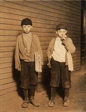 Portrait of Two Brothers, Harry Becker, 12 years, Max Becker, 9 years, Selling Newspapers until 9pm, Lawrence, Massachusetts, USA, Lewis Hine, 1910