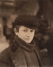 Portrait of Young Newsboy during Light Snowfall, Utica, New York, USA, Lewis Hine, 1910