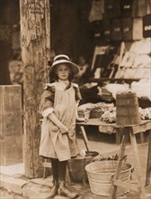 Young Girl Selling Vegetables at Street Stand, Wilmington, Delaware, USA, Lewis Hine, 1910