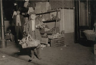 11-year-old Boy Selling Celery at 10:30pm, Shift ends at 11:00pm, Washington DC, USA, Lewis Hine, 1912