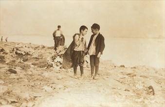 Two Young Boys Picking Over Garbage at Dump, Boston, Massachusetts, USA, Lewis Hine, 1909