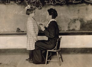 Woman Teaching Young Deaf Girl To Talk, Training School for Deaf Mutes, Sulphur, Oklahoma, USA, Lewis Hine, 1917