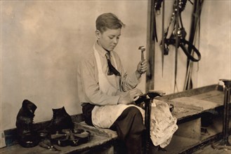 Young Boy Learning to Make Shoes at Training School for Deaf Mutes, Sulphur, Oklahoma, USA, Lewis Hine, 1917