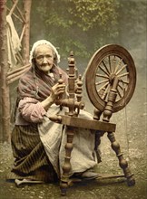 Irish Spinner and Spinning Wheel, County Galway, Ireland, Photochrome Print, Detroit Publishing Company, 1900