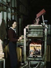 Worker Operating Machine for Putting Tops on Crates at Co-op Orange Packing Plant, Redlands, California, USA, Jack Delano for Office of War Information, 1943