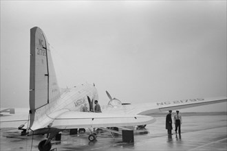 Airplane on Tarmac on Rainy Day, Municipal Airport, Washington DC, USA, Jack Delano for Farm Security Administration, July 1941