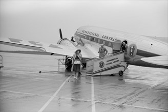 Passengers Leaving Airplane, Municipal Airport, Washington DC, USA, Jack Delano for Farm Security Administration, July 1941