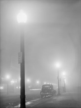 Car Parked on Street on Foggy Night, New Bedford, Massachusetts, USA, Jack Delano for Farm Security Administration, January 1941